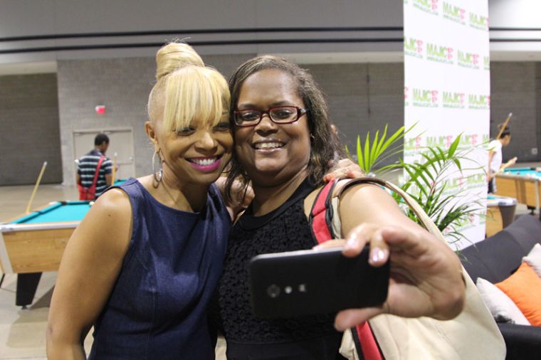 Carol Blackmon Taking Selfies With Fans