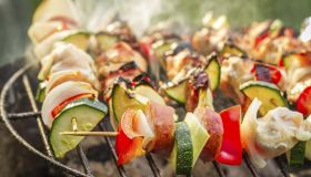 Hot skewers on the grill with fire