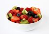 Bowl of fresh soft fruits and berries.