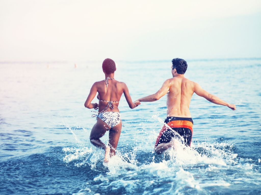 mixed race couple enjoying on summer vacation