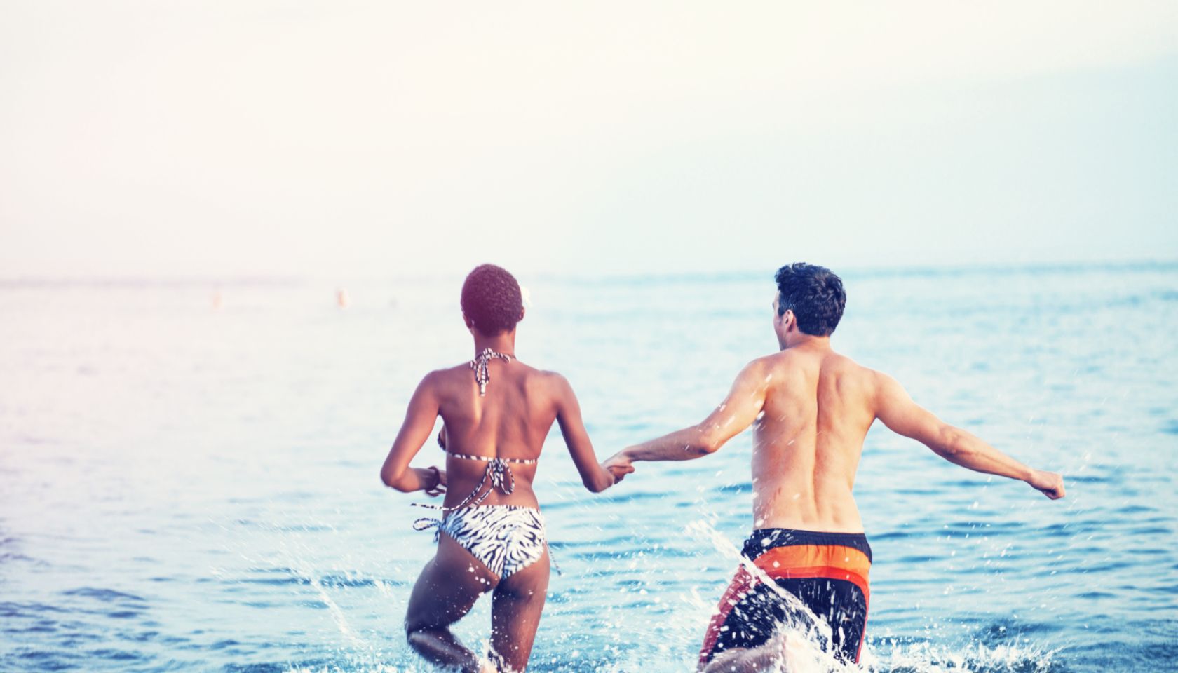 mixed race couple enjoying on summer vacation