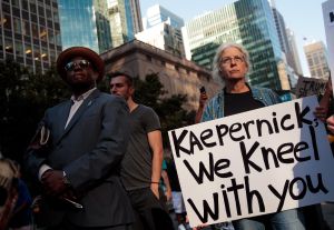 Rally In Support Of NFL Quarterback Colin Kaepernick Outside The League's HQ In New York