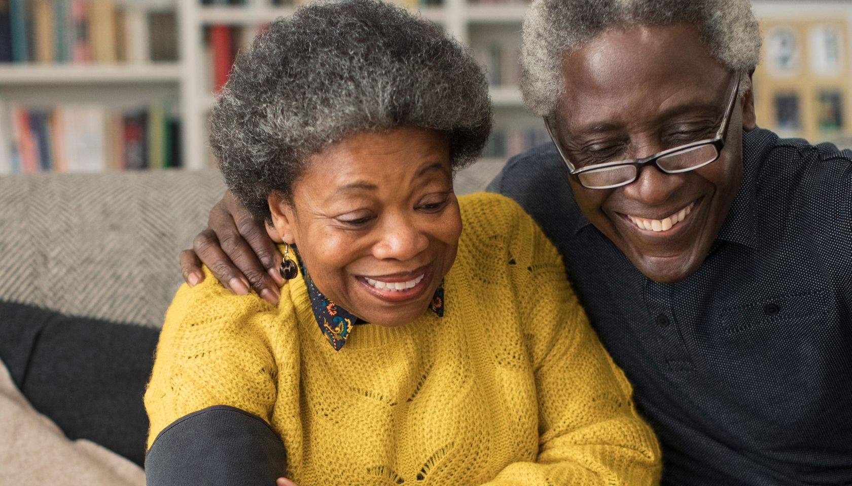 Senior couple checking blood pressure