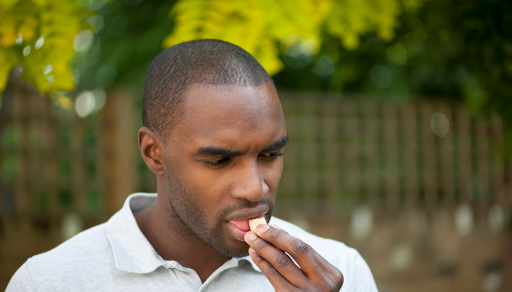 Diabetic taking a glucose tablet