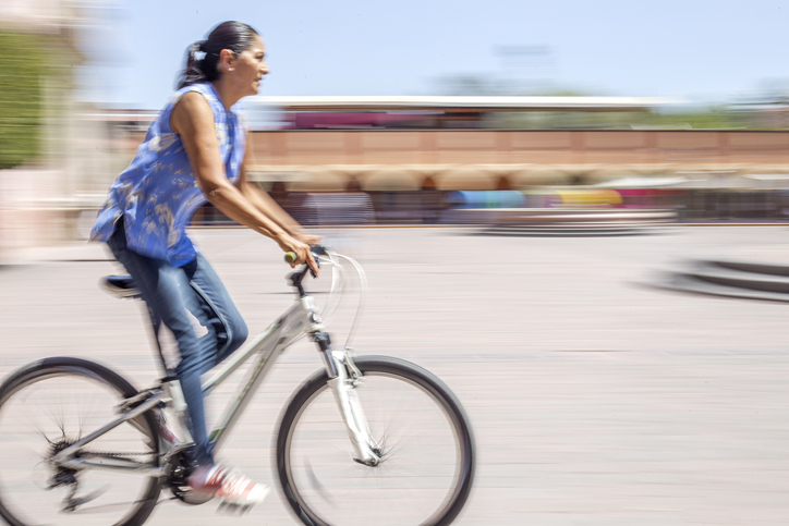 Latina woman, cycling
