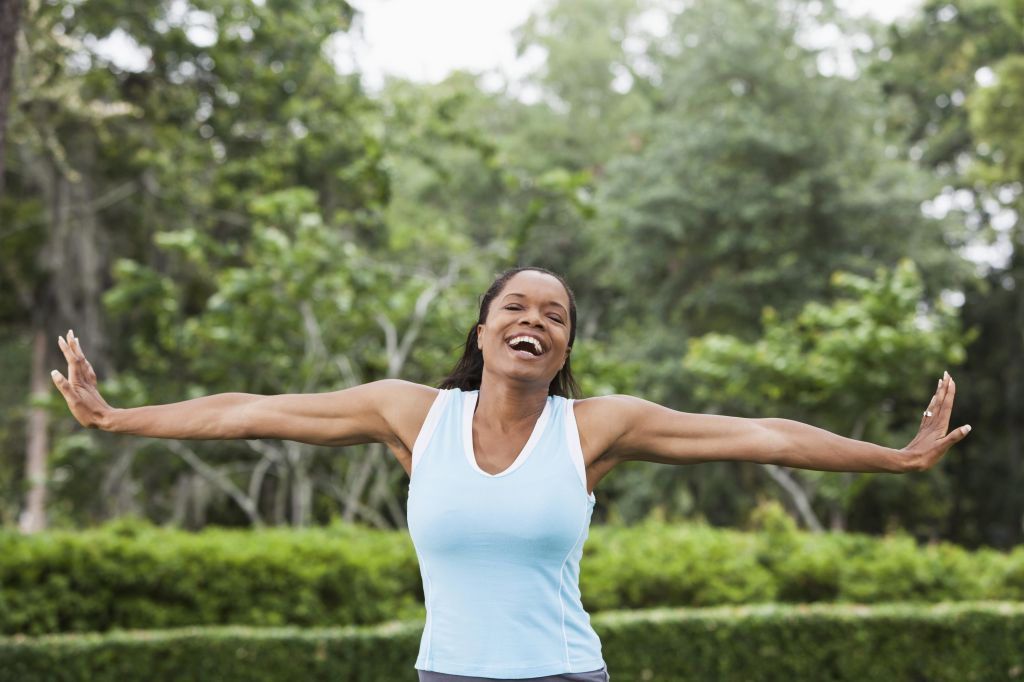 African American woman exercising in park