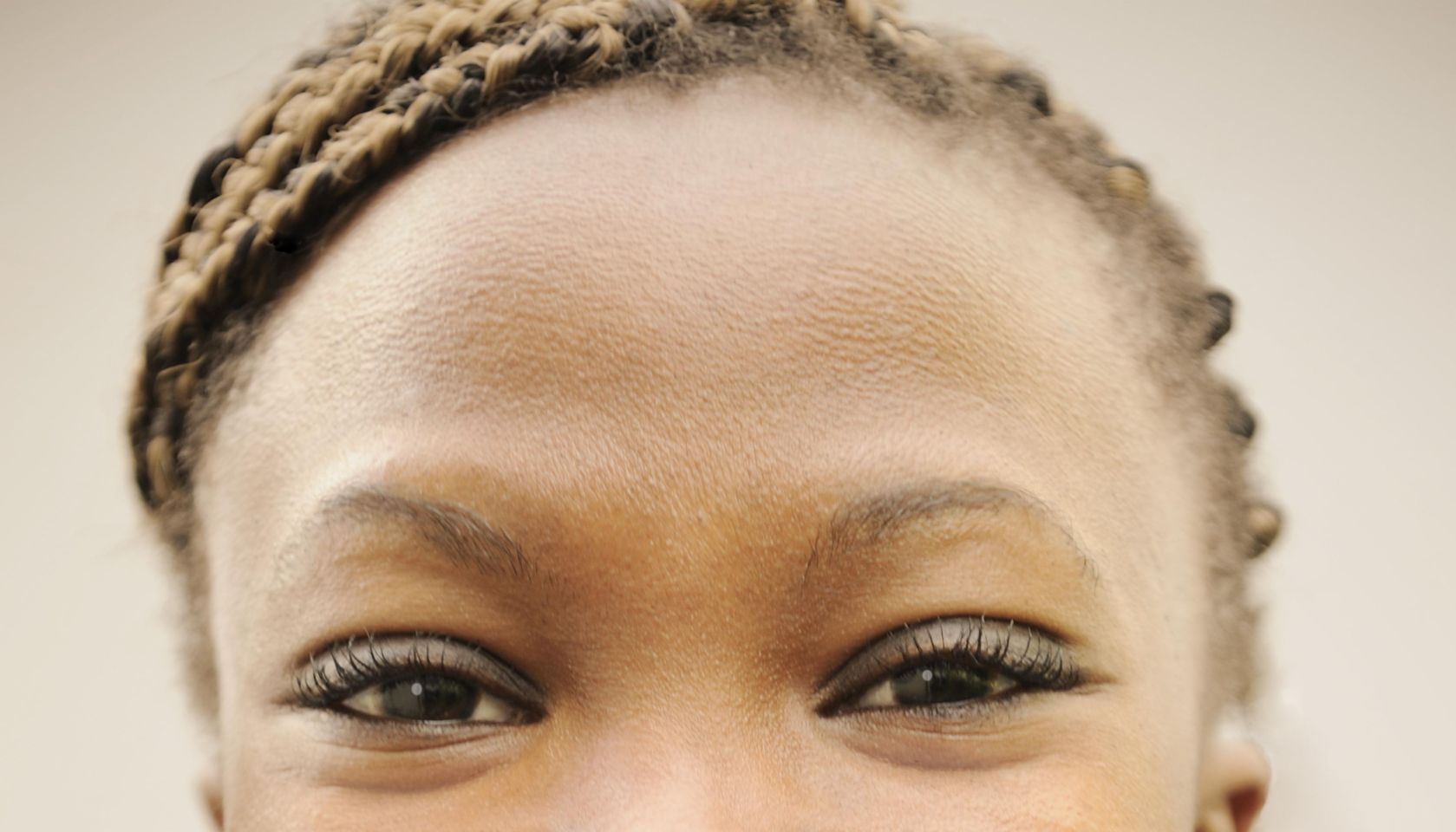 Woman biting into a chocolate slab