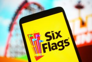 In this photo illustration the Six Flags Entertainment...