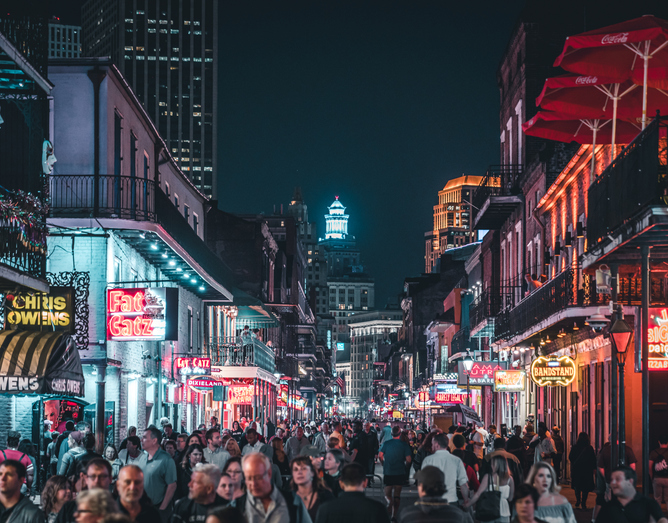 Vibrant Nightlife on Bourbon Street, New Orleans: A Bustling Hub of Music, Neon Lights, and Cultural Energy