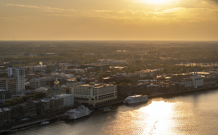 River street in old historical city Savannah in Georgia. Southern USA cityscape at sunset