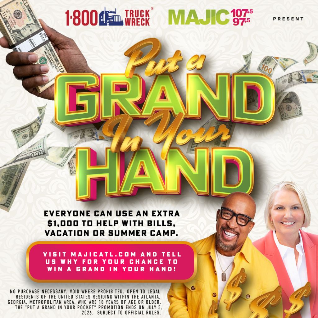 A promotional image for a contest called "Put a Grand in Your Hand" featuring a smiling man and woman, with text advertising a $1,000 prize and instructions to visit the website Majicatl.com.