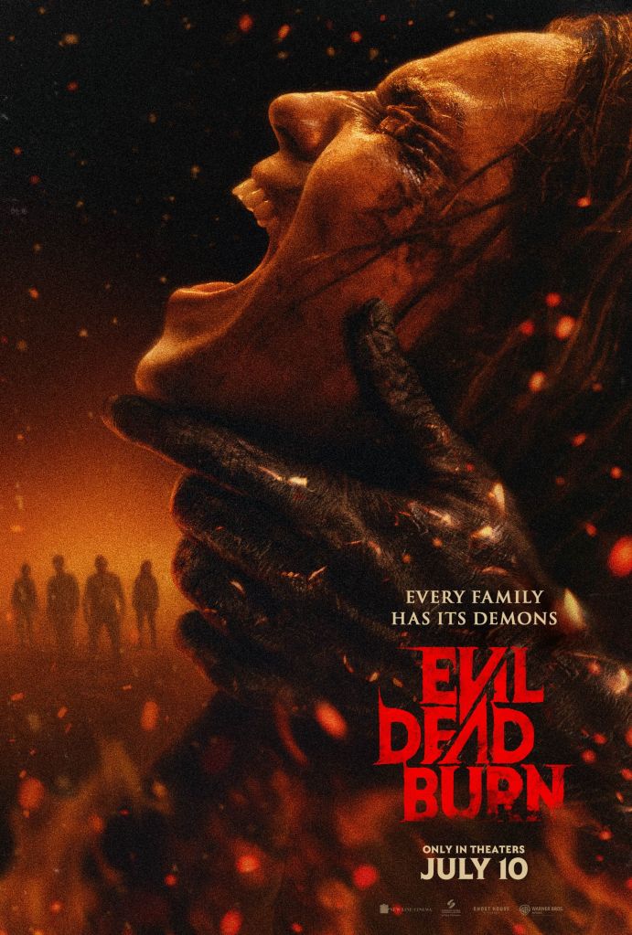 A close-up of a demonic, fiery face with glowing eyes and a menacing expression. The text "EVIL DEAD BURN" and "ONLY IN THEATERS JULY 10" appears below the face.
