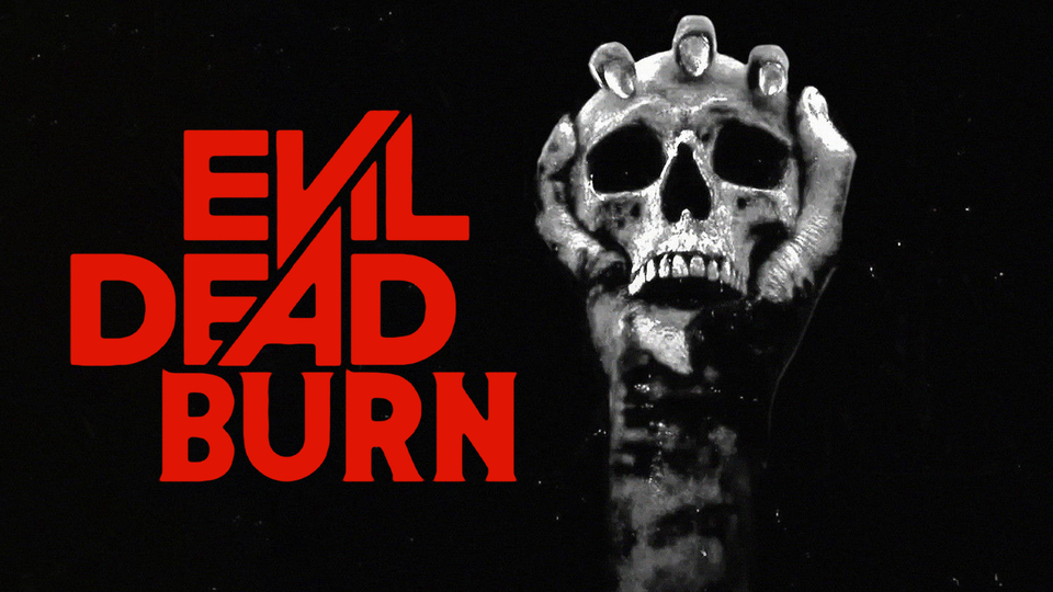 A black and white image showing a large, menacing skull with horns against a dark background. The text "EVIL DEAD BURN" is prominently displayed in red.